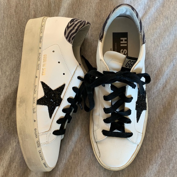 golden goose with black glitter star